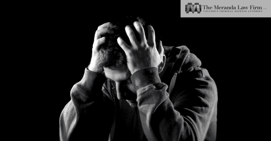 Desperate Man Clutching His Head